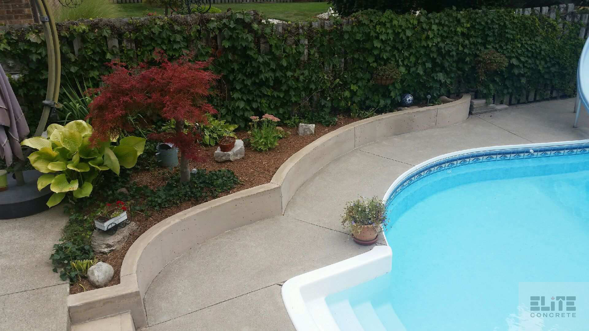 Small retaining wall around pool in St Thomas ON